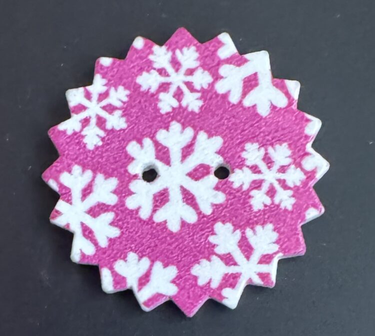 Botón puntas rosa copos de nieve