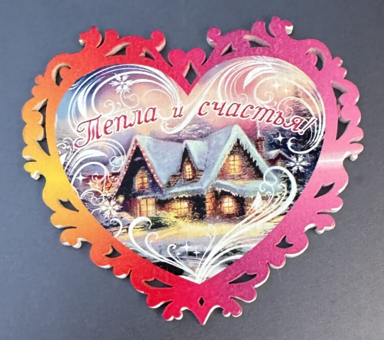 Corazón de madera casa navideña