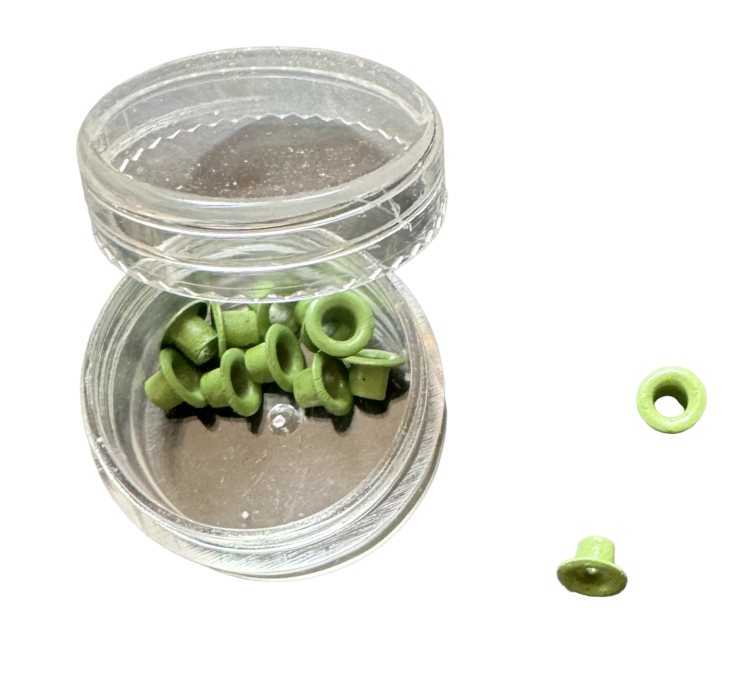 Bote ojales verde scrapbooking
