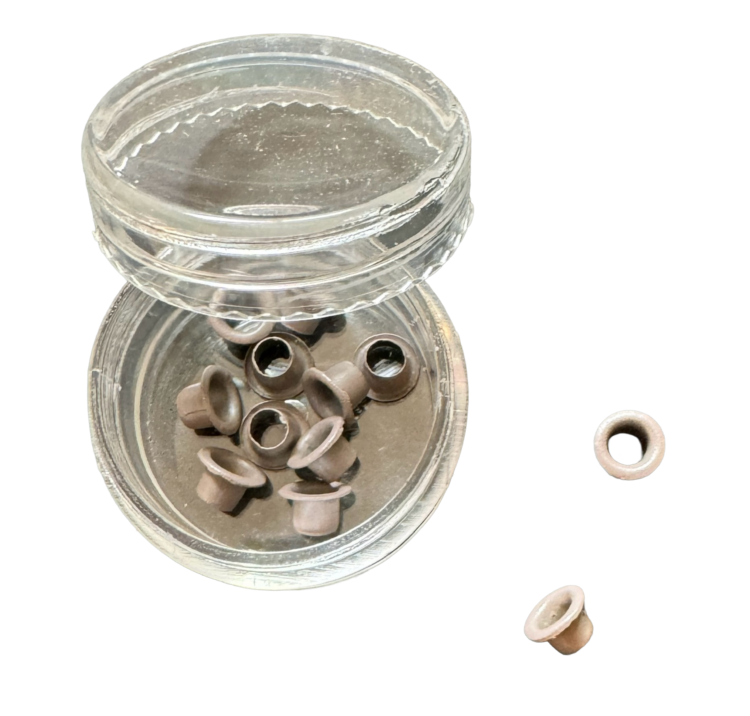 Bote ojales grisáceos scrapbooking